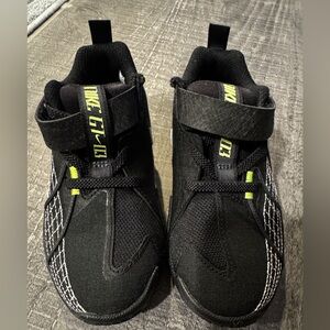 Nike G.T. Cut 3 kids' size 10 basketball shoe in Black, White and Neon Green